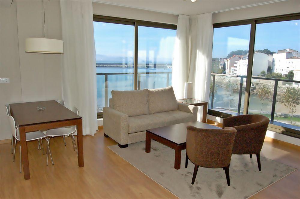 Apartamentos Turísticos Playa de Osmo Corme Exterior foto